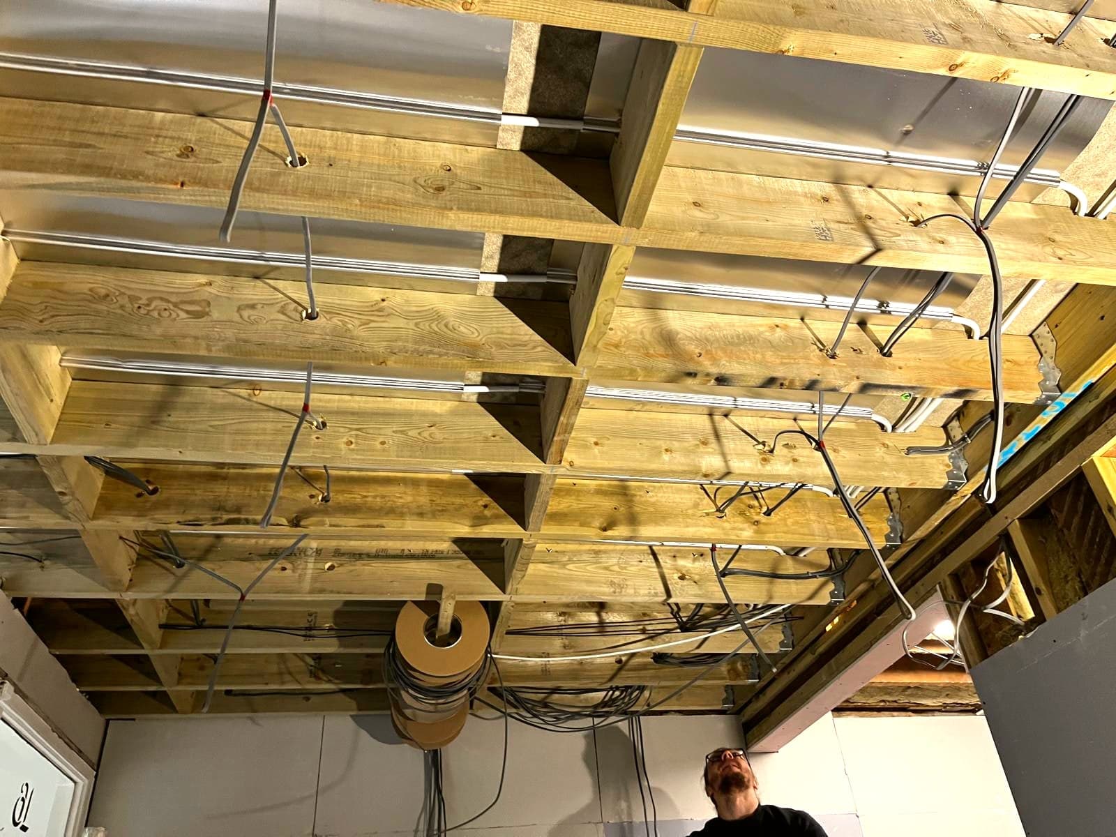 First-fix cabling and ducting run through the timber ceiling joists, London extension