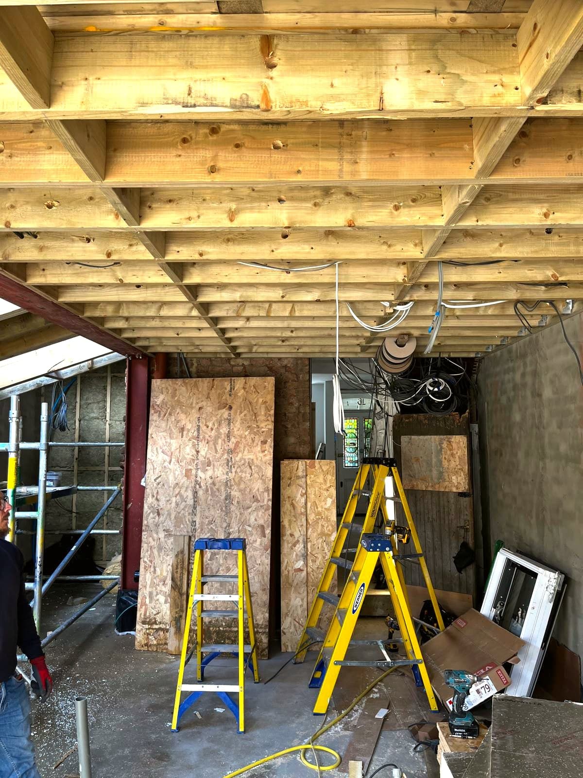 New glazing frame installed while first fix continues, London extension