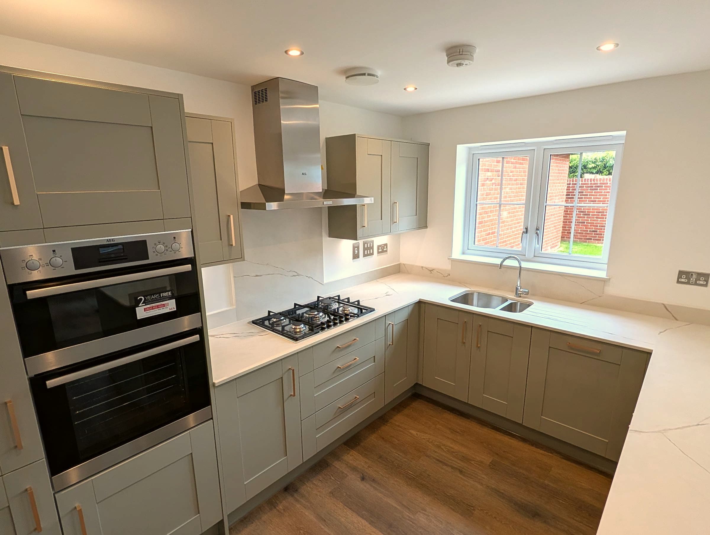 Sage shaker kitchen renovation, sink and hob, London