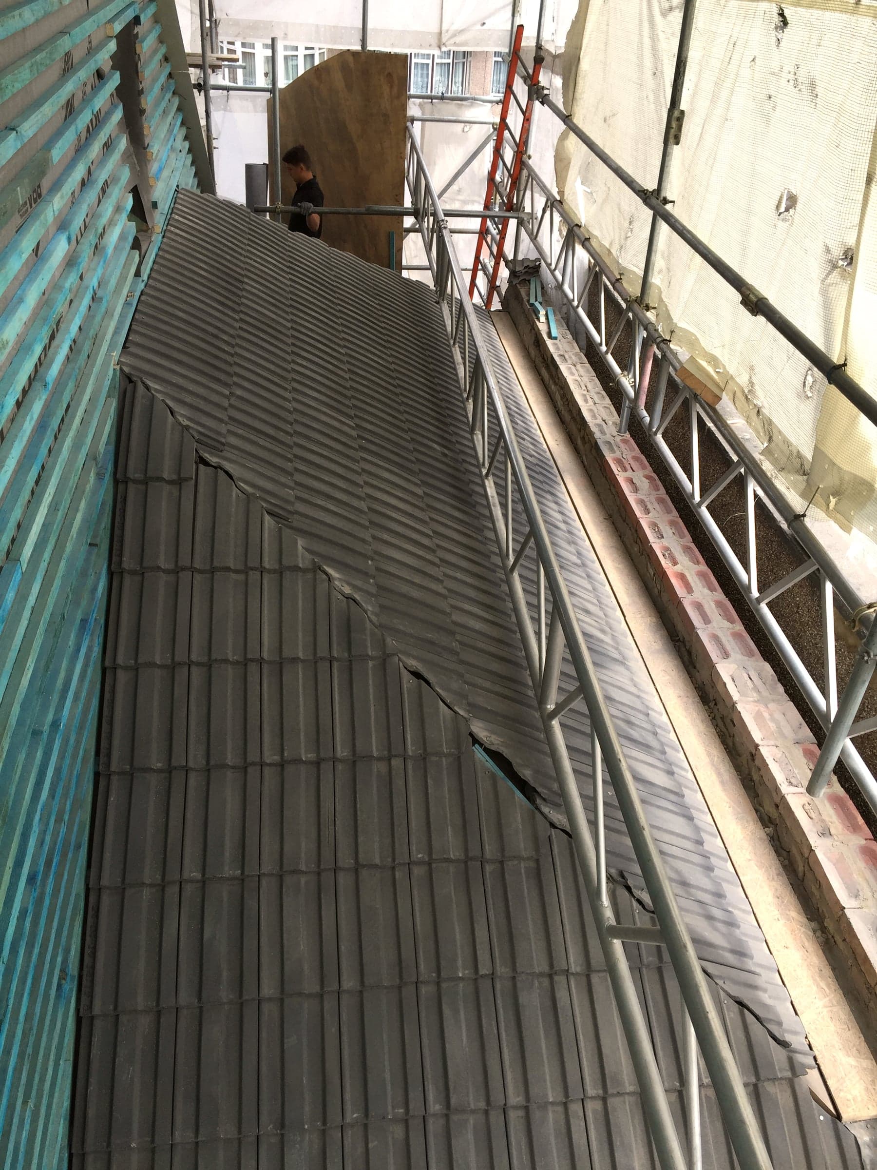 New roof tiling matched to the existing roof, London loft conversion