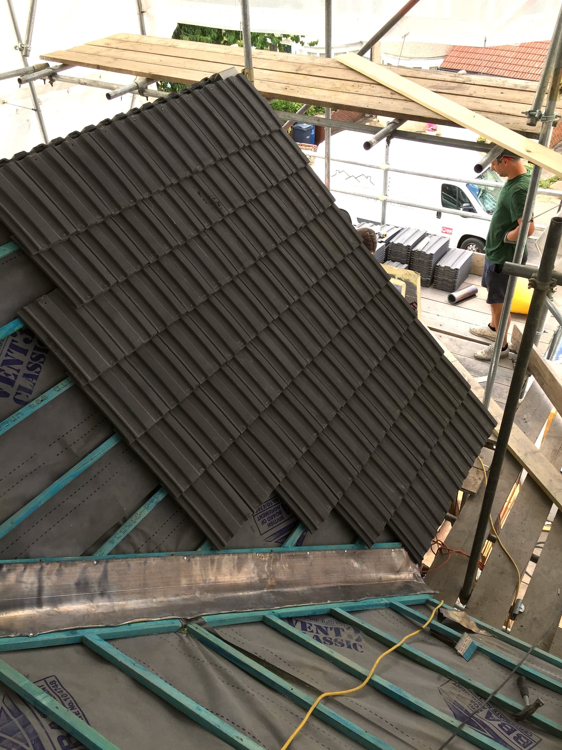 Velux skylights being installed, London loft conversion