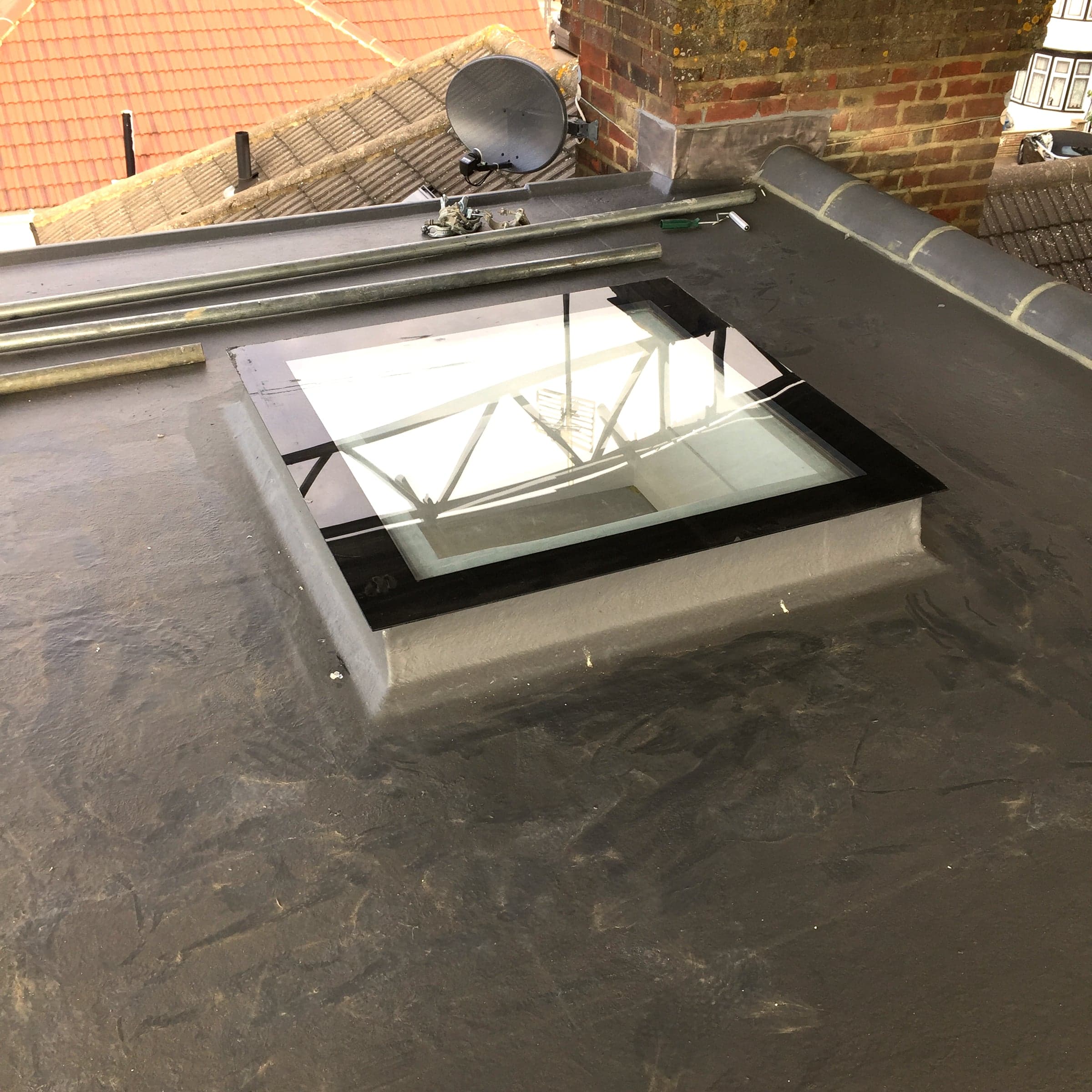 Ridge and bonnet hip roof tiling matched to the existing roof, London