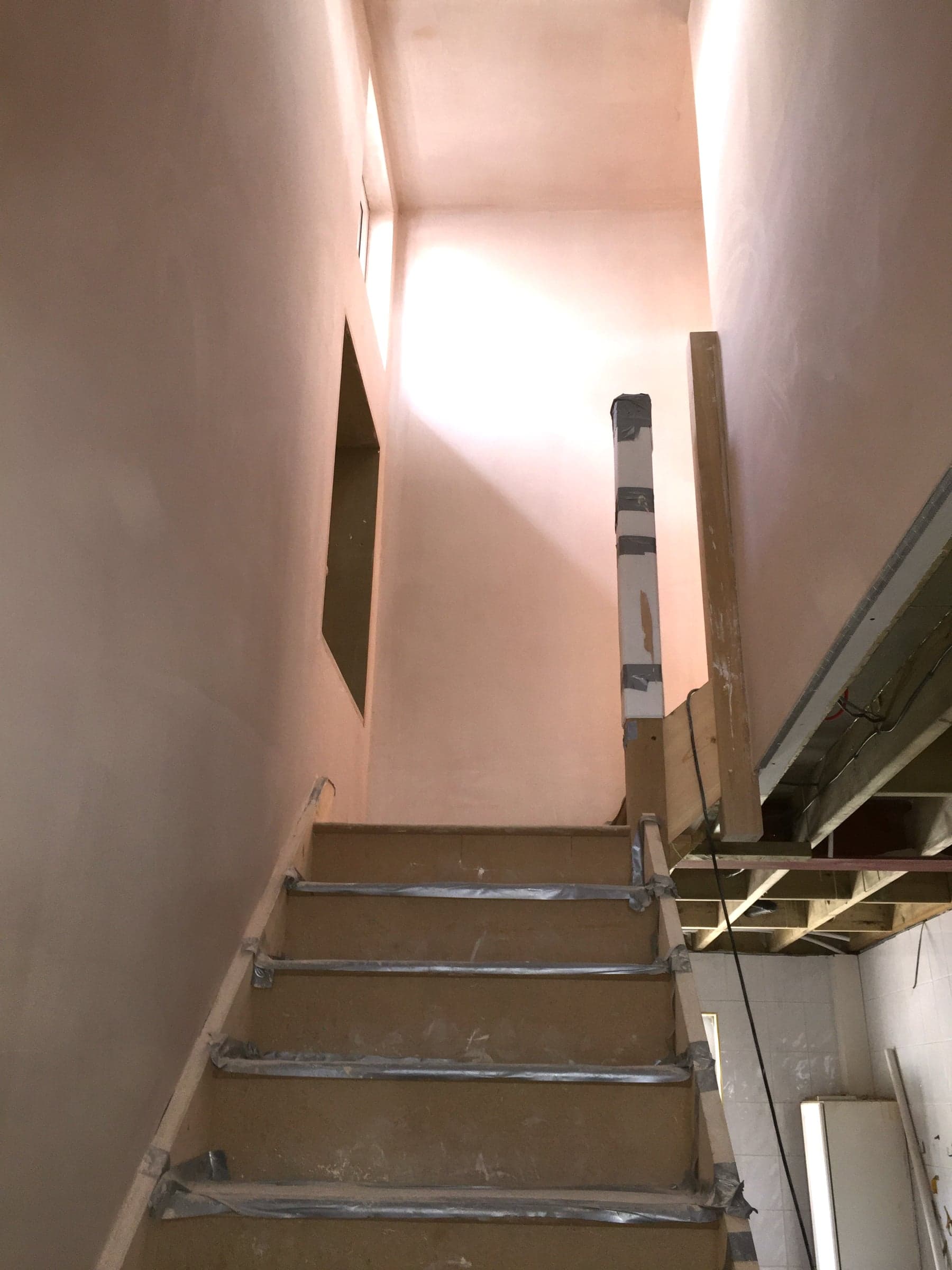 Staircase plastered during a loft conversion, London