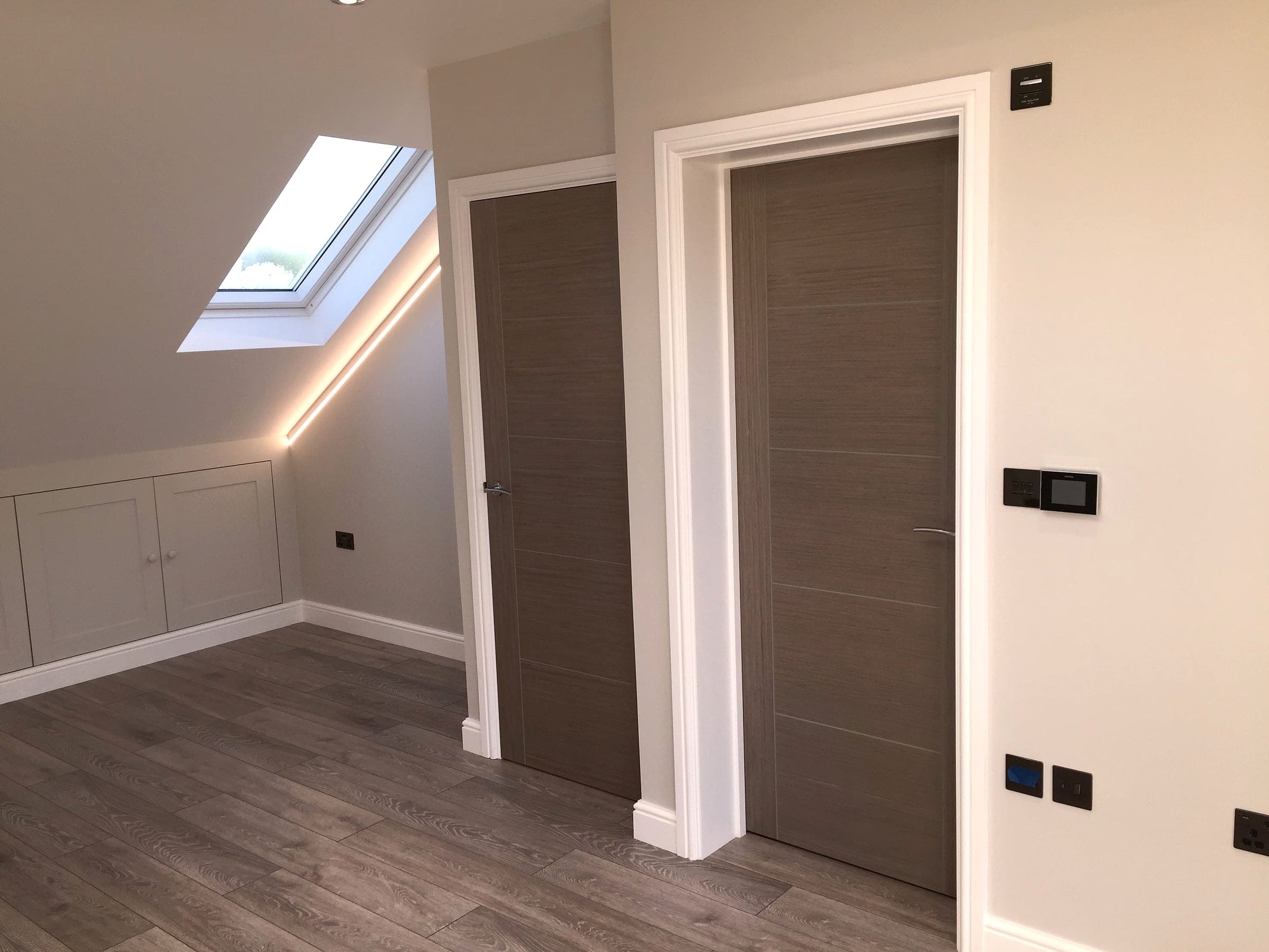 Finished doors and smart heating control panel, London loft conversion