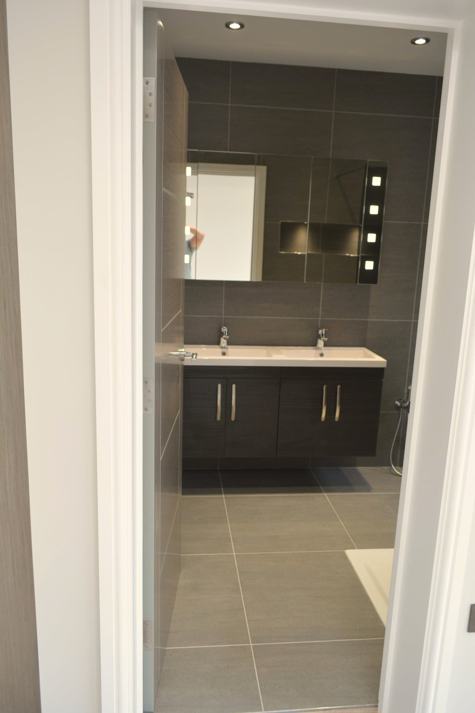 Double vanity with illuminated mirror cabinet, London loft conversion