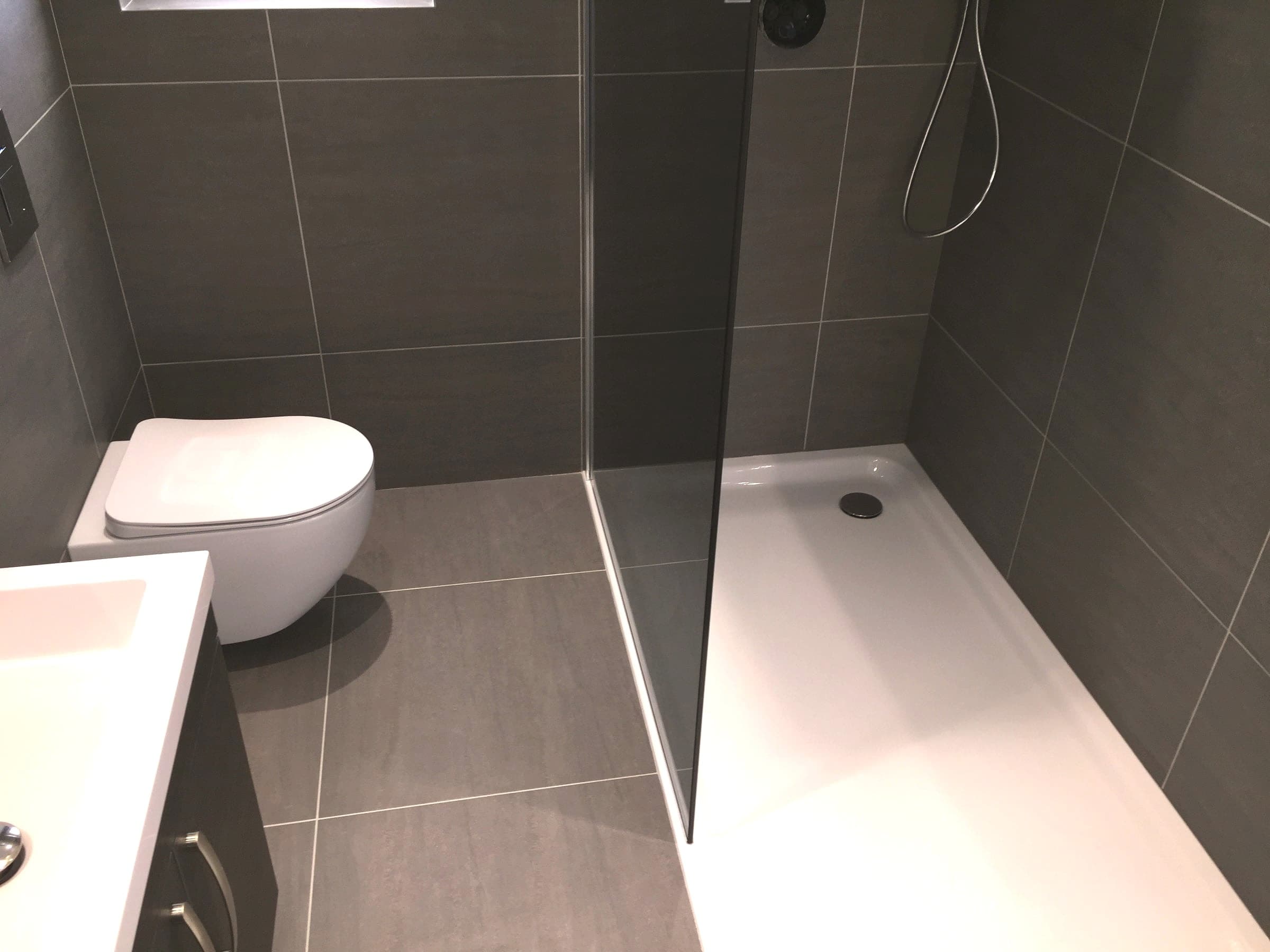 Finished vanity basins and chrome taps, London loft conversion
