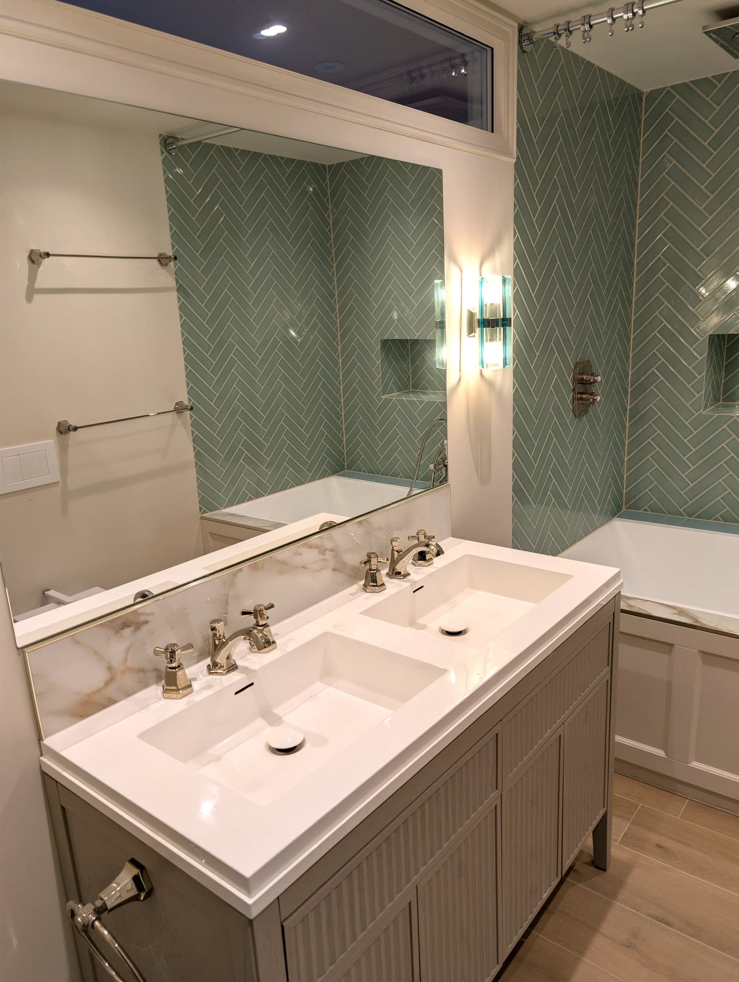 Elegant herringbone tile bathroom renovation with double vanity, Fulham SW6