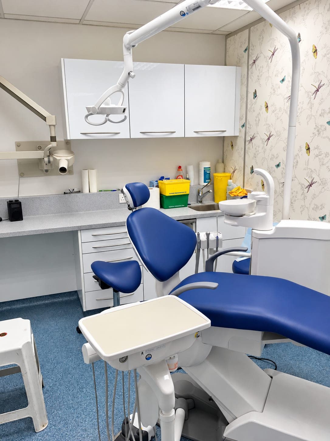 Dental chair, delivery unit and wall cabinets above the worktop, Belmont Circle HA3