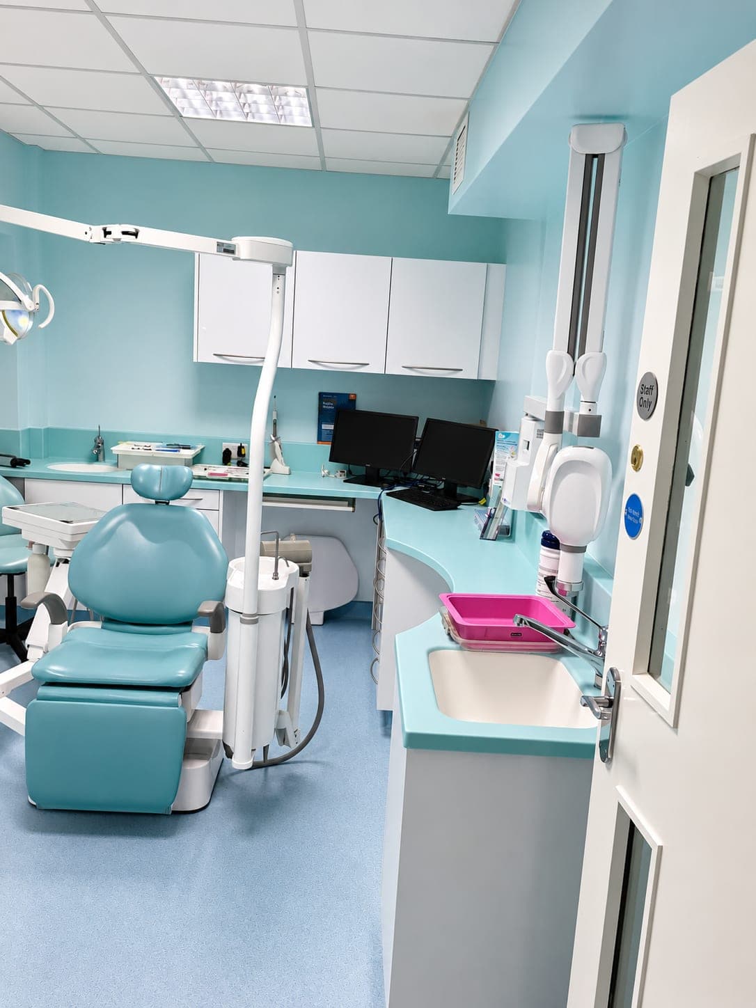 Surgery with chair, worktop run and wall cabinets, Bishopsgate EC2