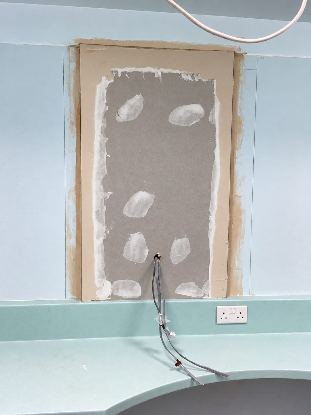 Lead-lined panel built into the wall for the X-ray unit, Bishopsgate EC2