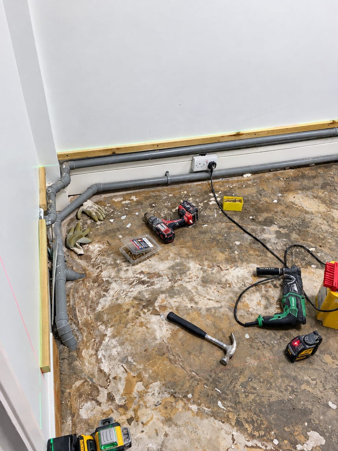 Old screed broken out ready for new drainage and suction runs, Bishopsgate EC2
