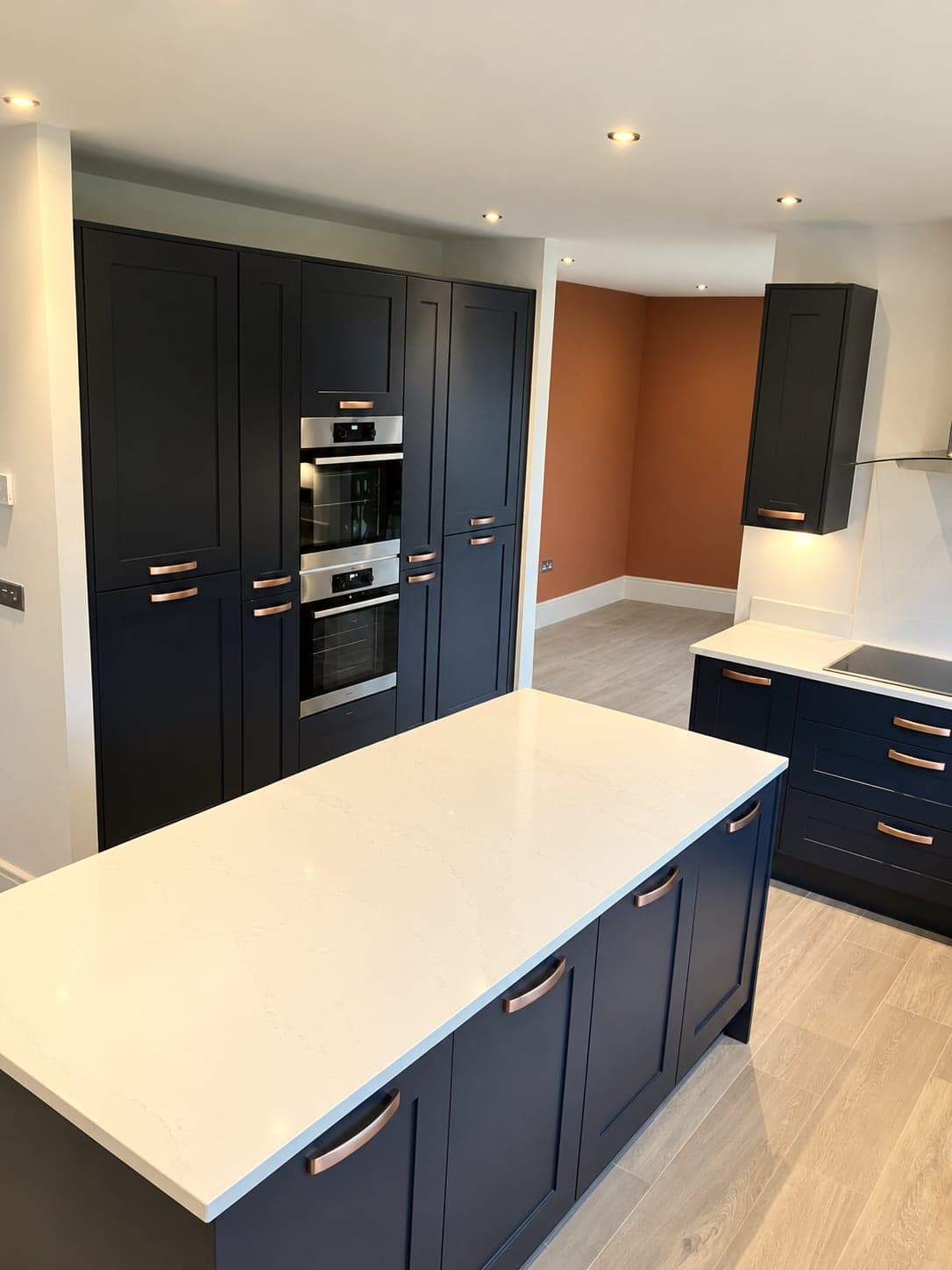 Built-in double oven and microwave in the charcoal housing beside the island, Notting Hill W11
