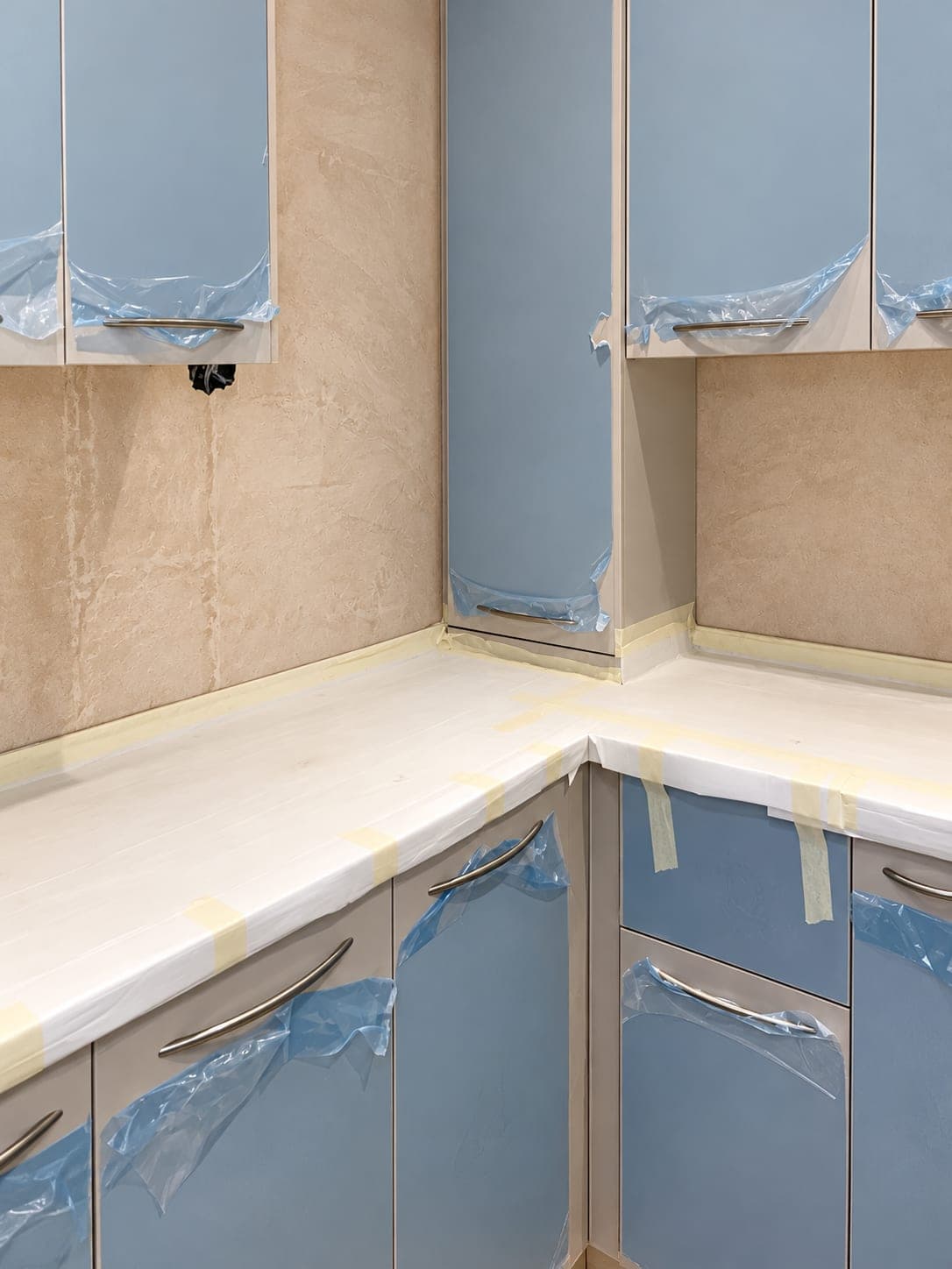 Units protected and taped while the room is finished around them, Chiswick W4