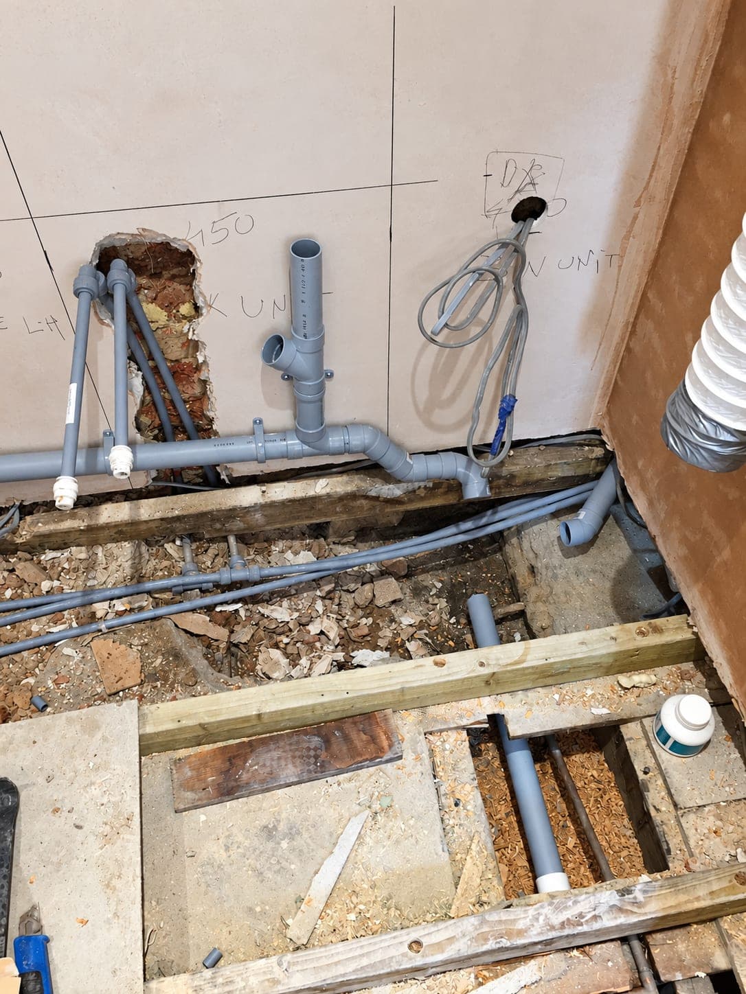 Floor lifted to re-route drainage and water supplies for the new sinks, Chiswick W4
