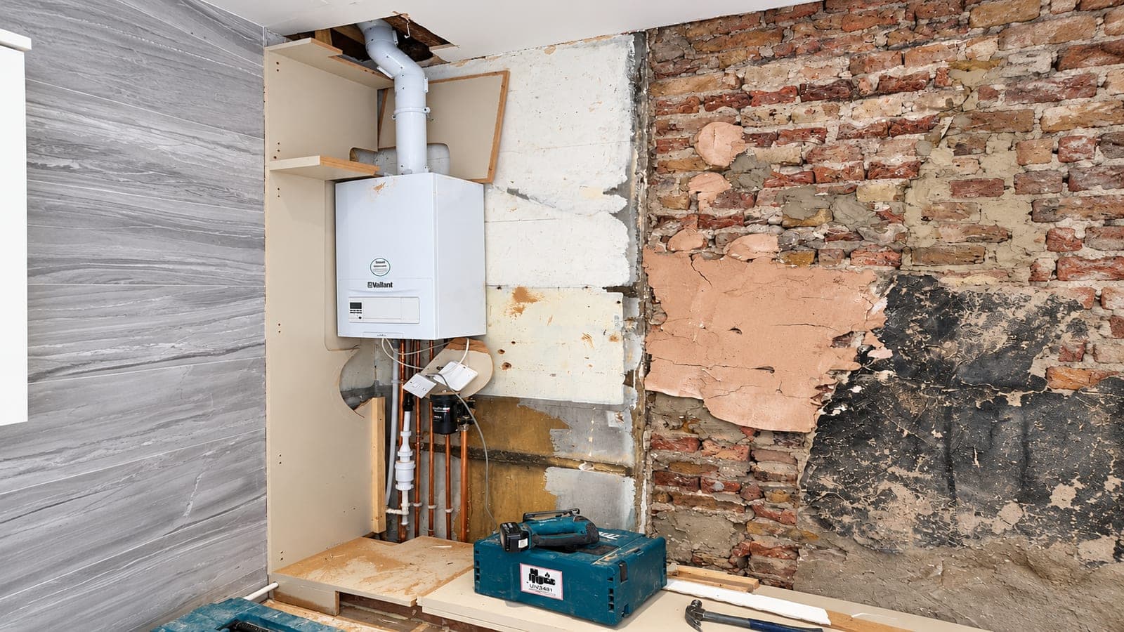 Boiler and services exposed during the strip-out, Chiswick W4