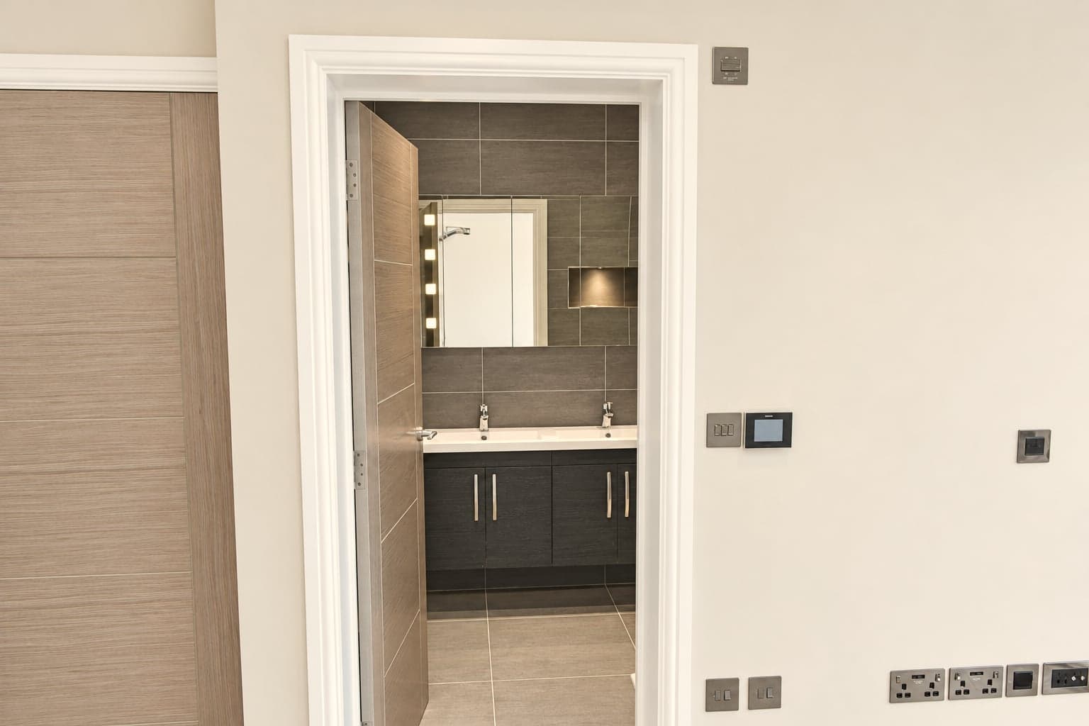 Doorway through to the new en-suite, tiled and fitted, Hampstead NW3