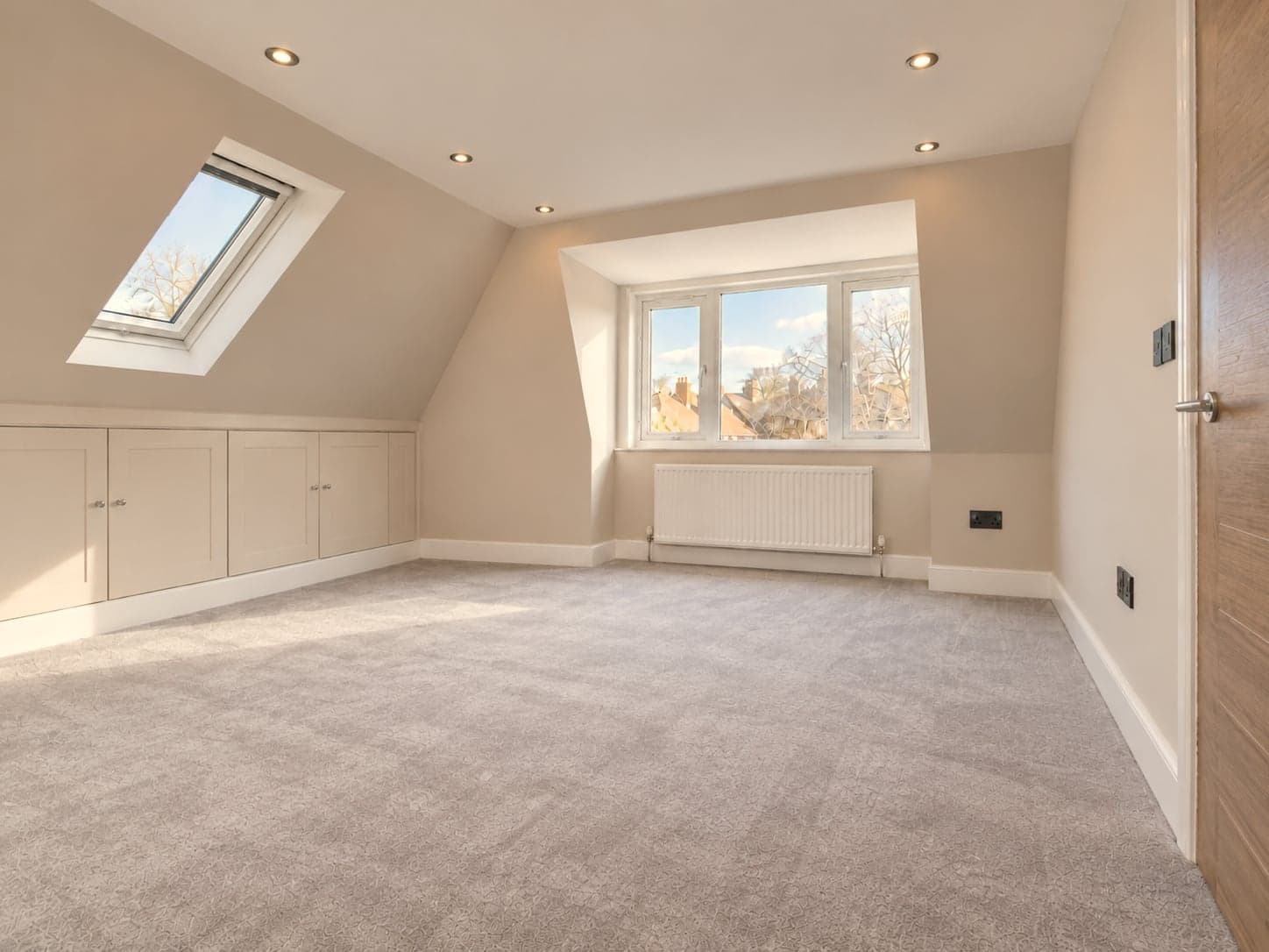 Loft bedroom with roof window, dormer and radiator under the sill, Rickmansworth WD3