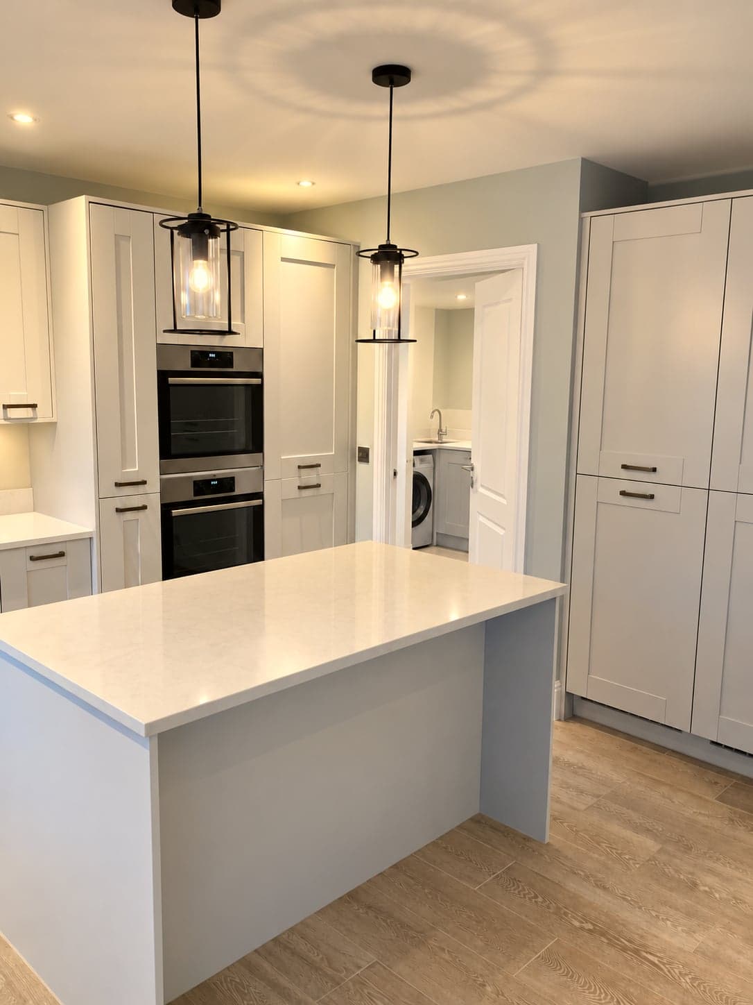 Island and pendants with the utility door open behind, Shepherds Bush W12