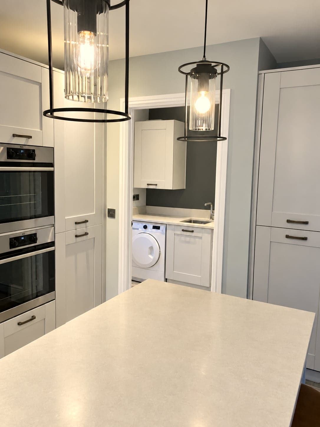 Kitchen from the island end looking to the oven tower and utility, Shepherds Bush W12