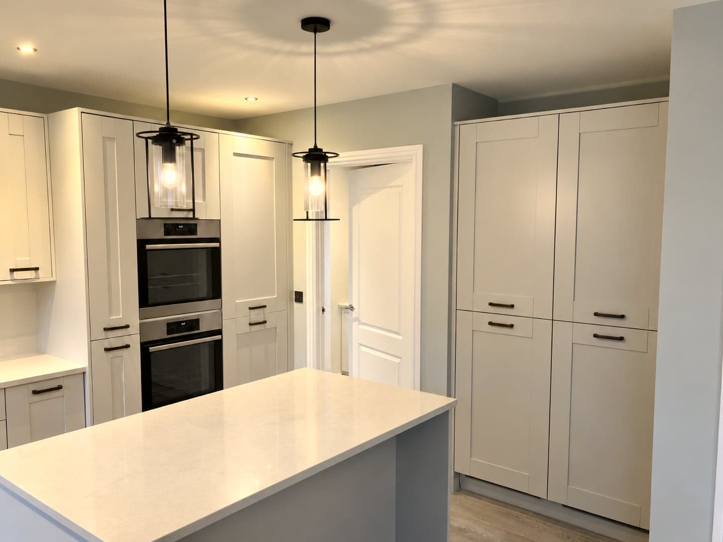 Dove grey shaker kitchen renovation with statement pendant lighting, Shepherds Bush W12