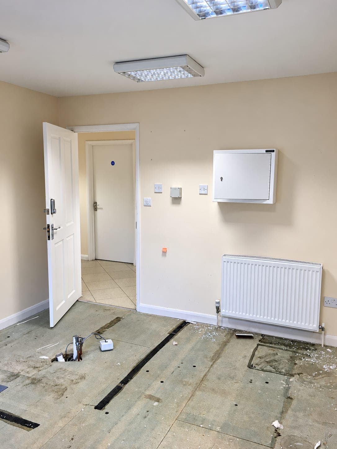Room back to bare walls and floor, ready for new flooring and fit-out, Finchley N3