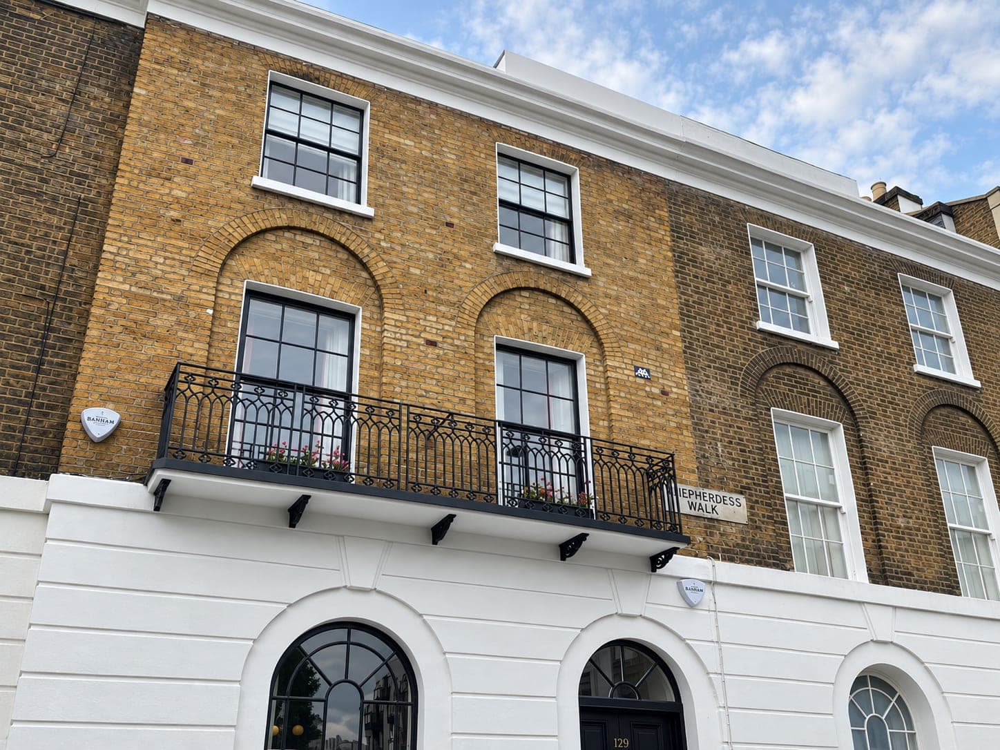 Looking along the restored terrace toward the end of the row, Shepherdess Walk N1