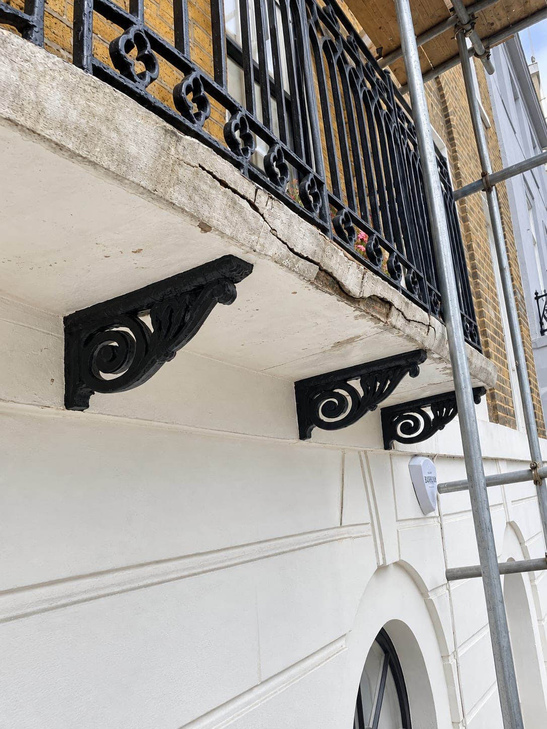 The repaired cornice and bracket painted back in, Shepherdess Walk N1