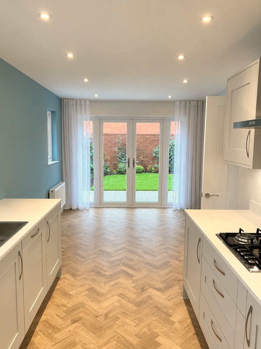 Looking down the kitchen to the French doors and garden, Amersham HP6