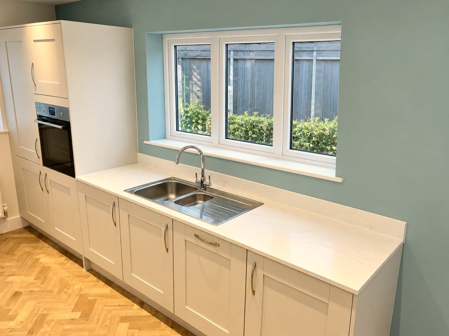 Sink and drainer below the window with the oven tower to the left, Amersham HP6