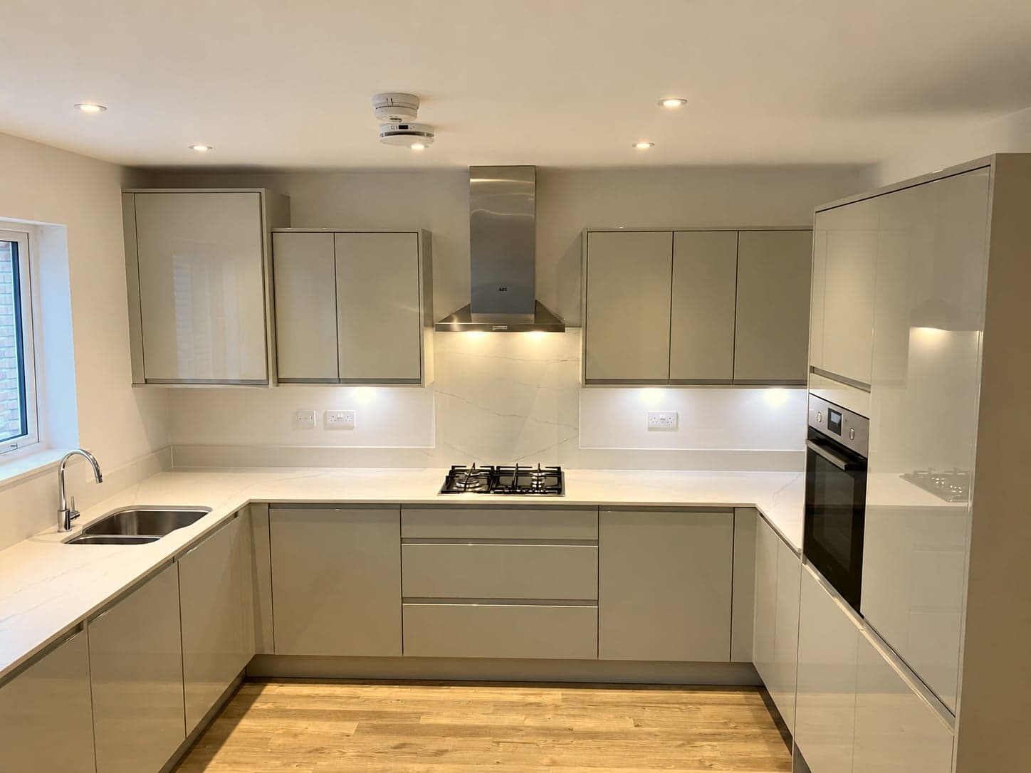 Handleless stone grey kitchen renovation, Battersea SW11
