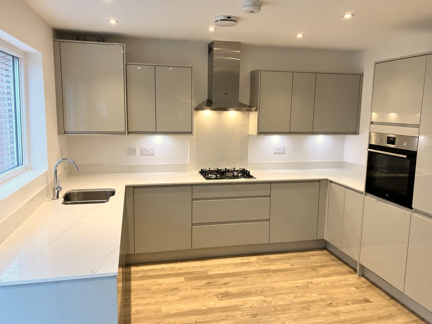 U-shaped layout with sink under the window and hob opposite, Battersea SW11