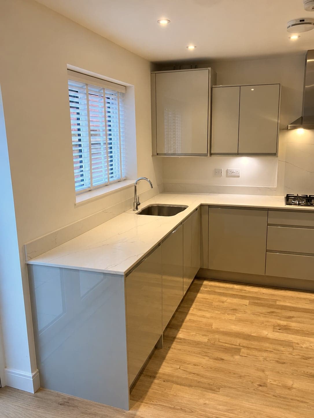 Peninsula and sink under the shuttered window, Battersea SW11