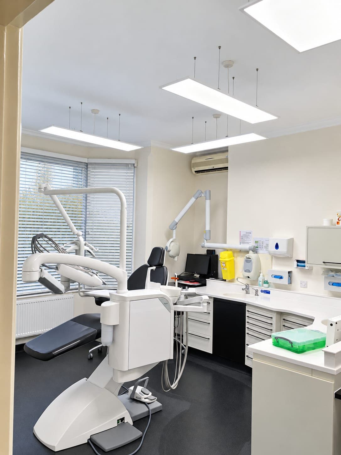 Treatment room with the chair set into the bay, air conditioning and new lighting above, Haverhill CB9