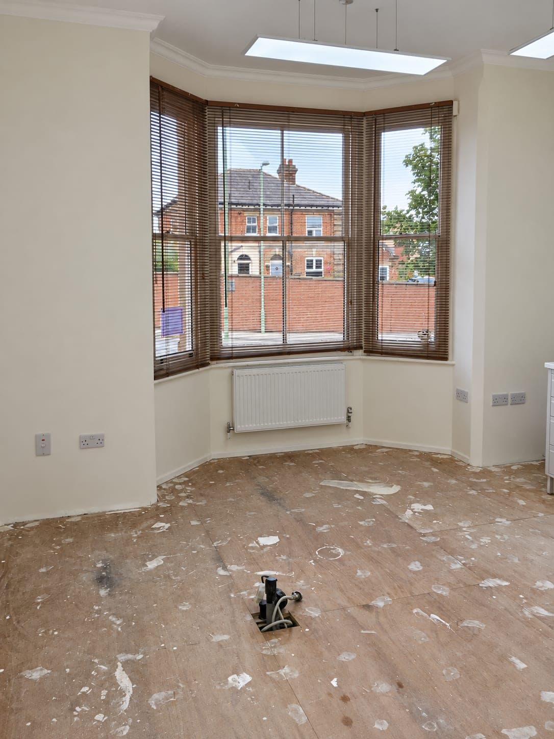 Room stripped back with the bay window exposed before the fit-out, Haverhill CB9