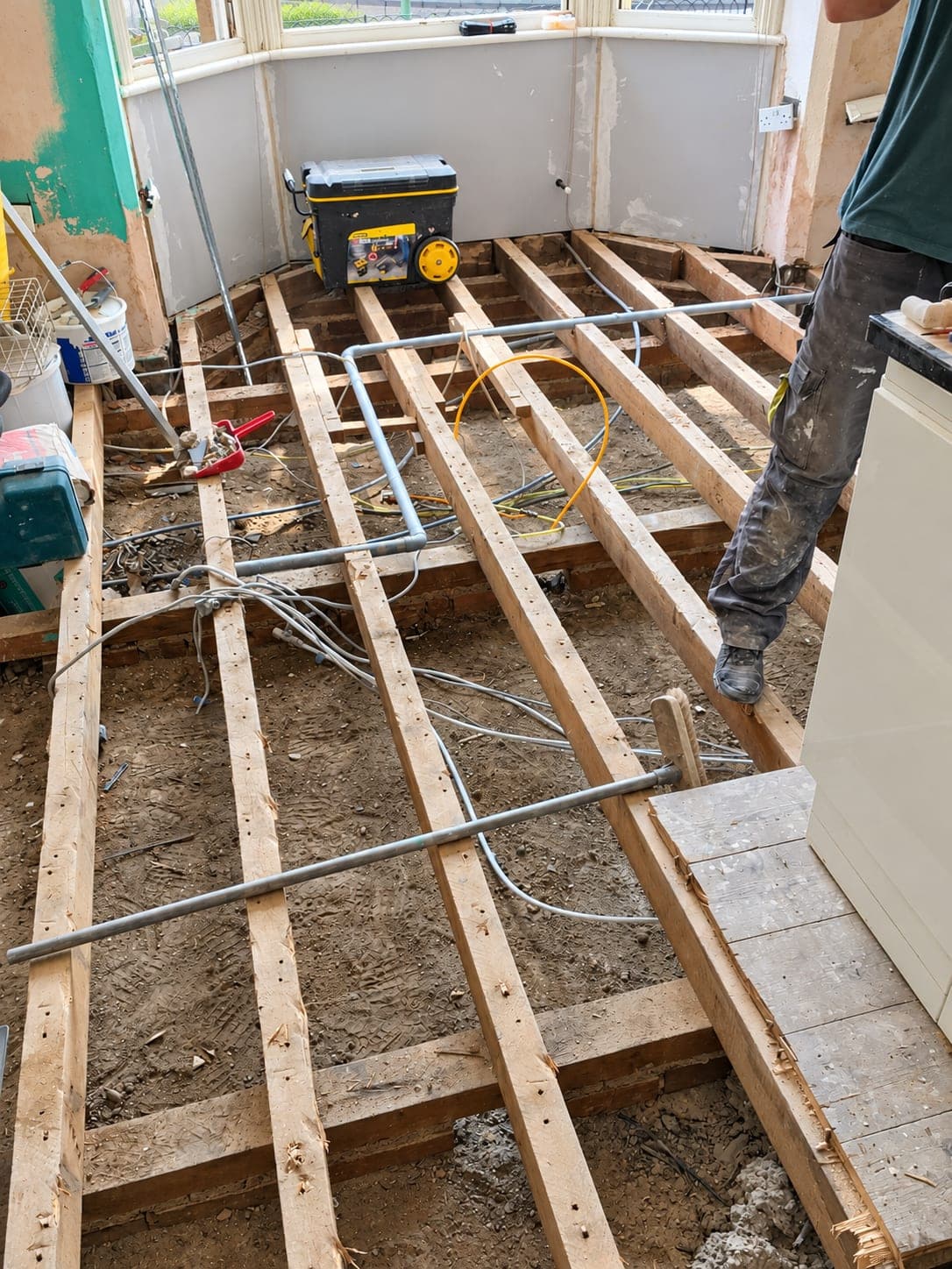 Joists exposed across the room while new services are installed, Haverhill CB9