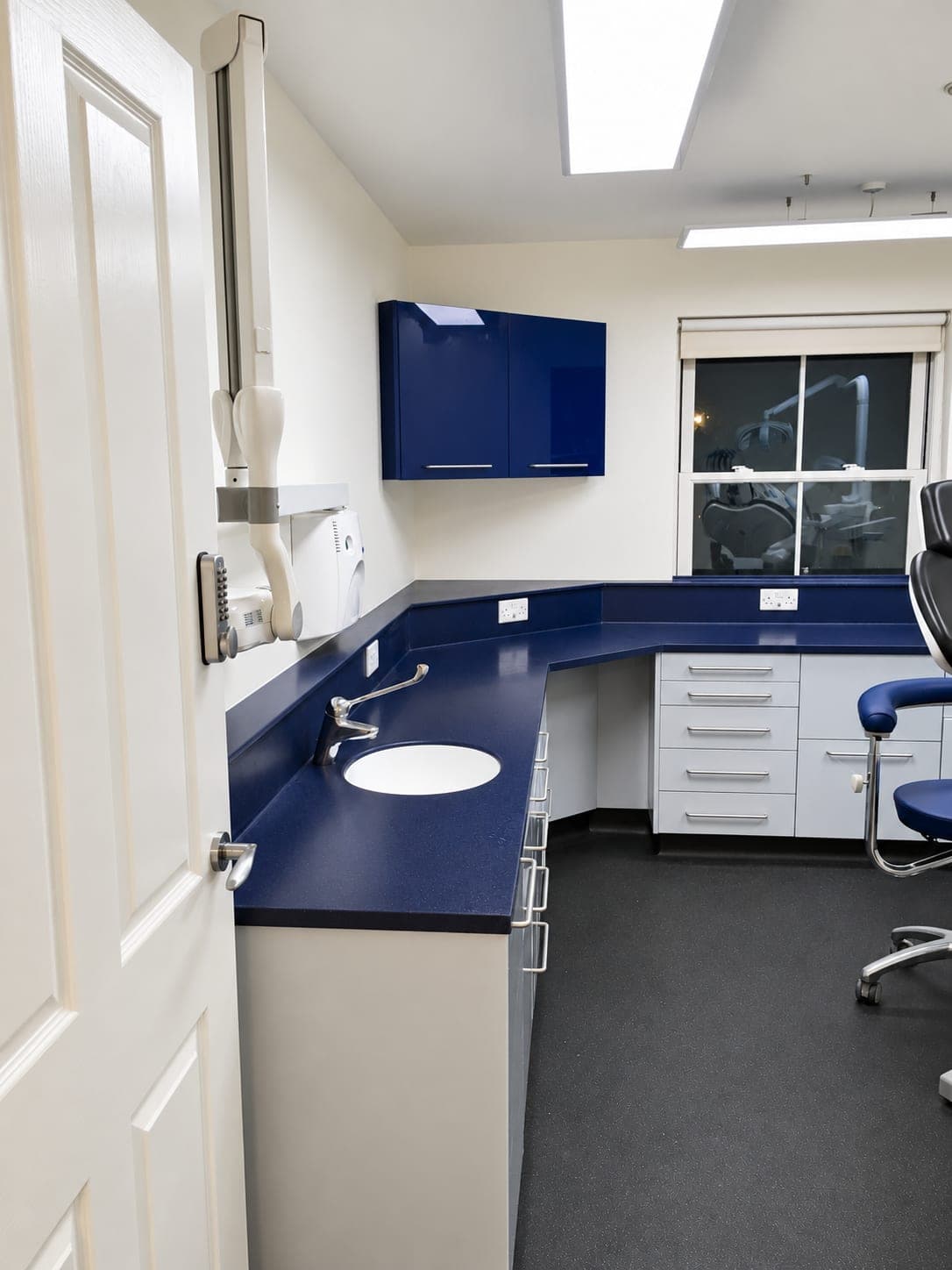 Navy worktop and inset basin with the chair and window to the right, Haverhill CB9