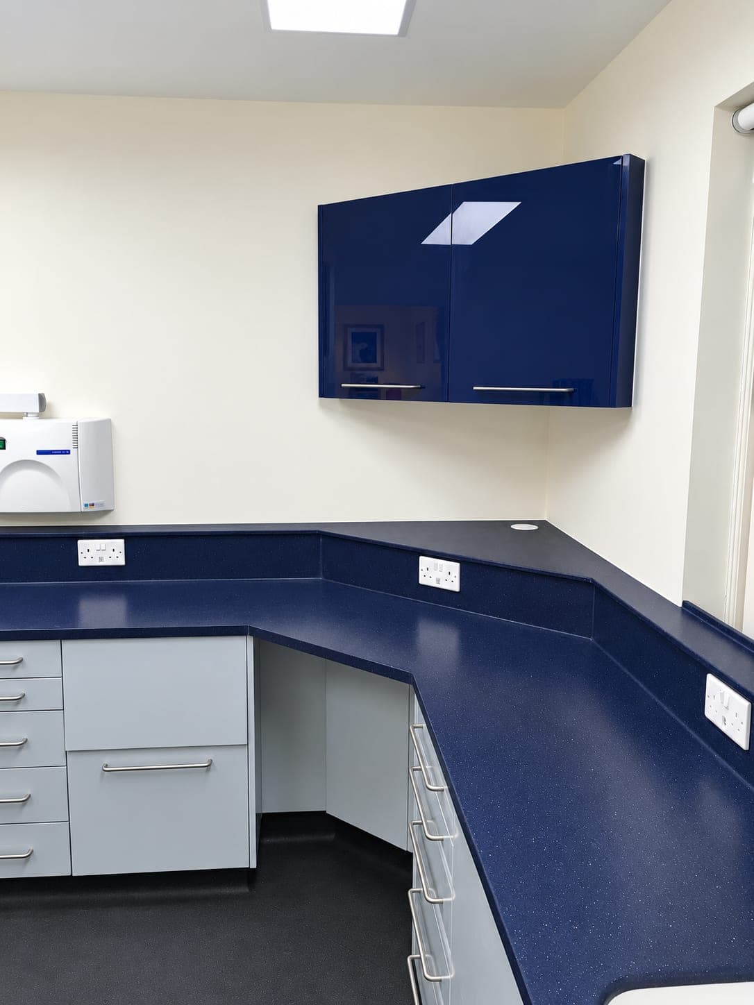 Navy wall unit above the worktop run and drawer units, Haverhill CB9