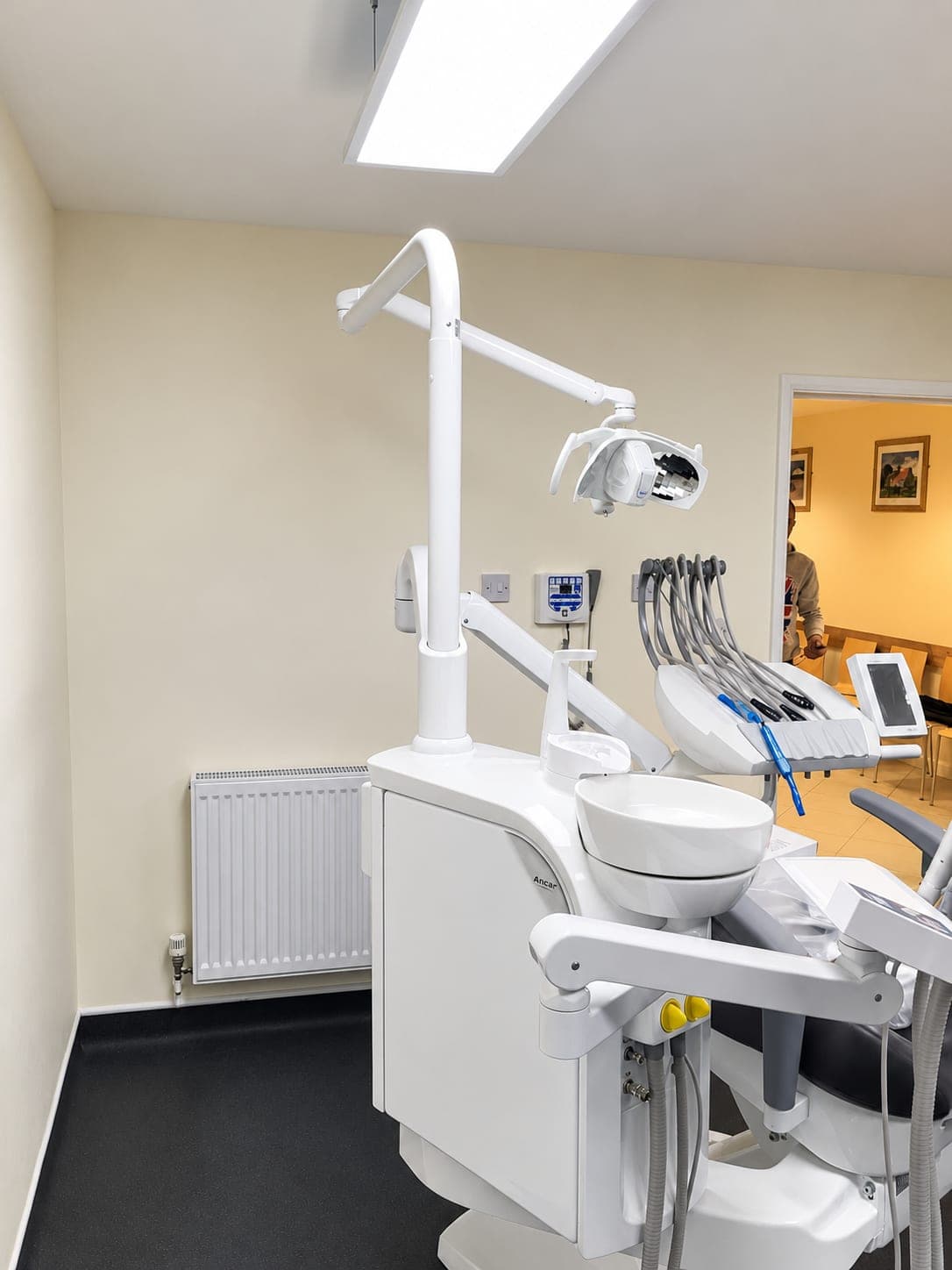 Surgery with chair, operating light and radiator below the window, Haverhill CB9