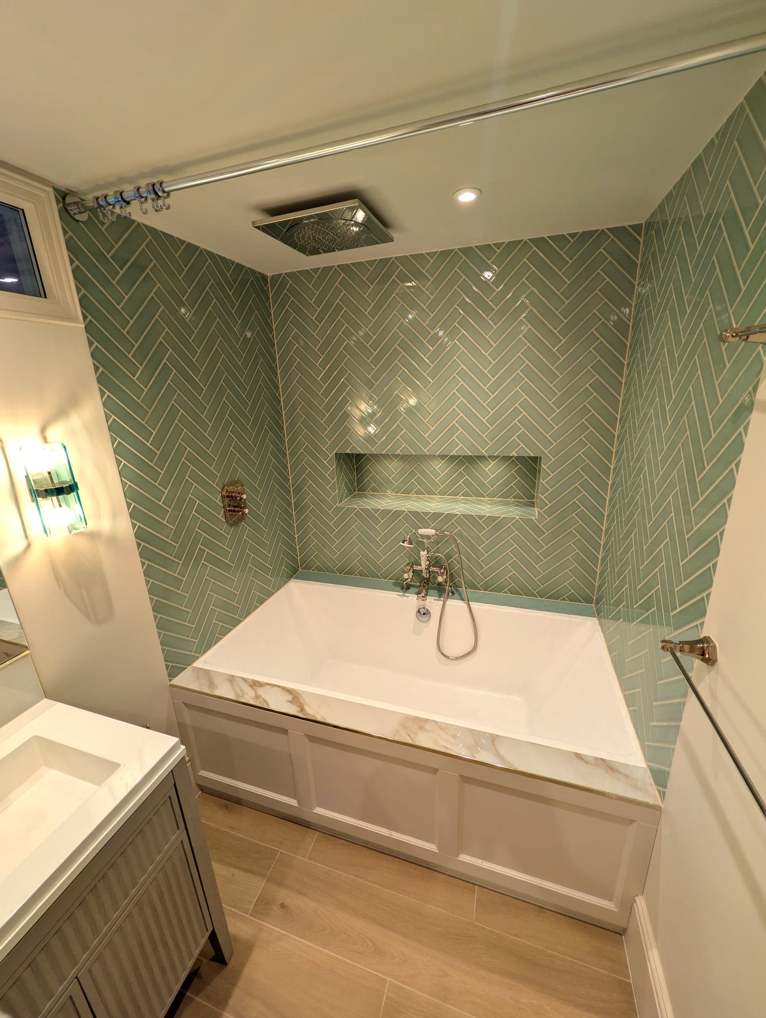Bath alcove with the marble vanity top in the foreground, Fulham SW6
