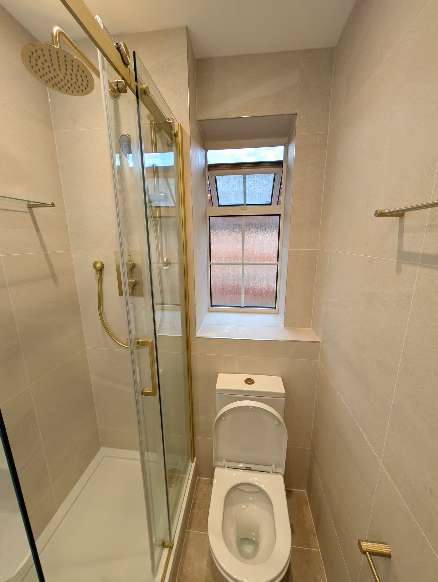 Shower enclosure and WC beneath the window, Nine Elms SW8