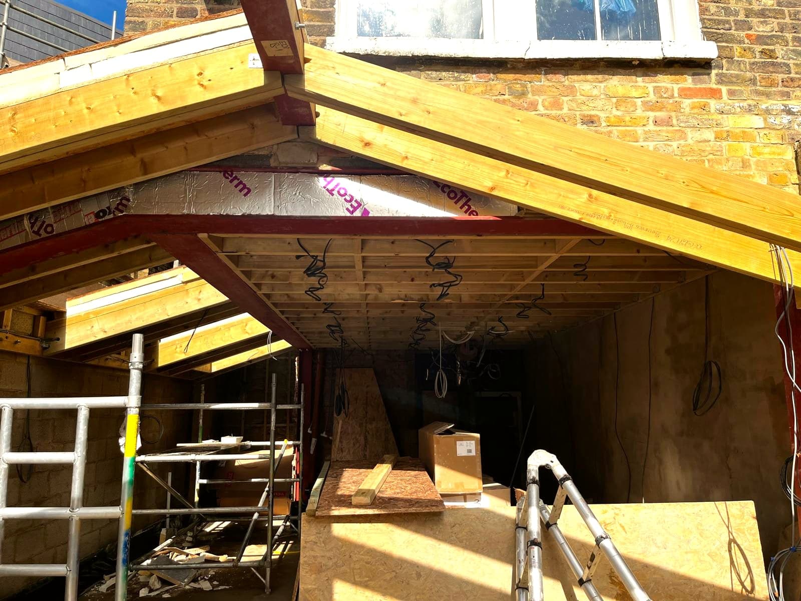 Timber rafters landing on the new blockwork and brickwork, St Albans AL1
