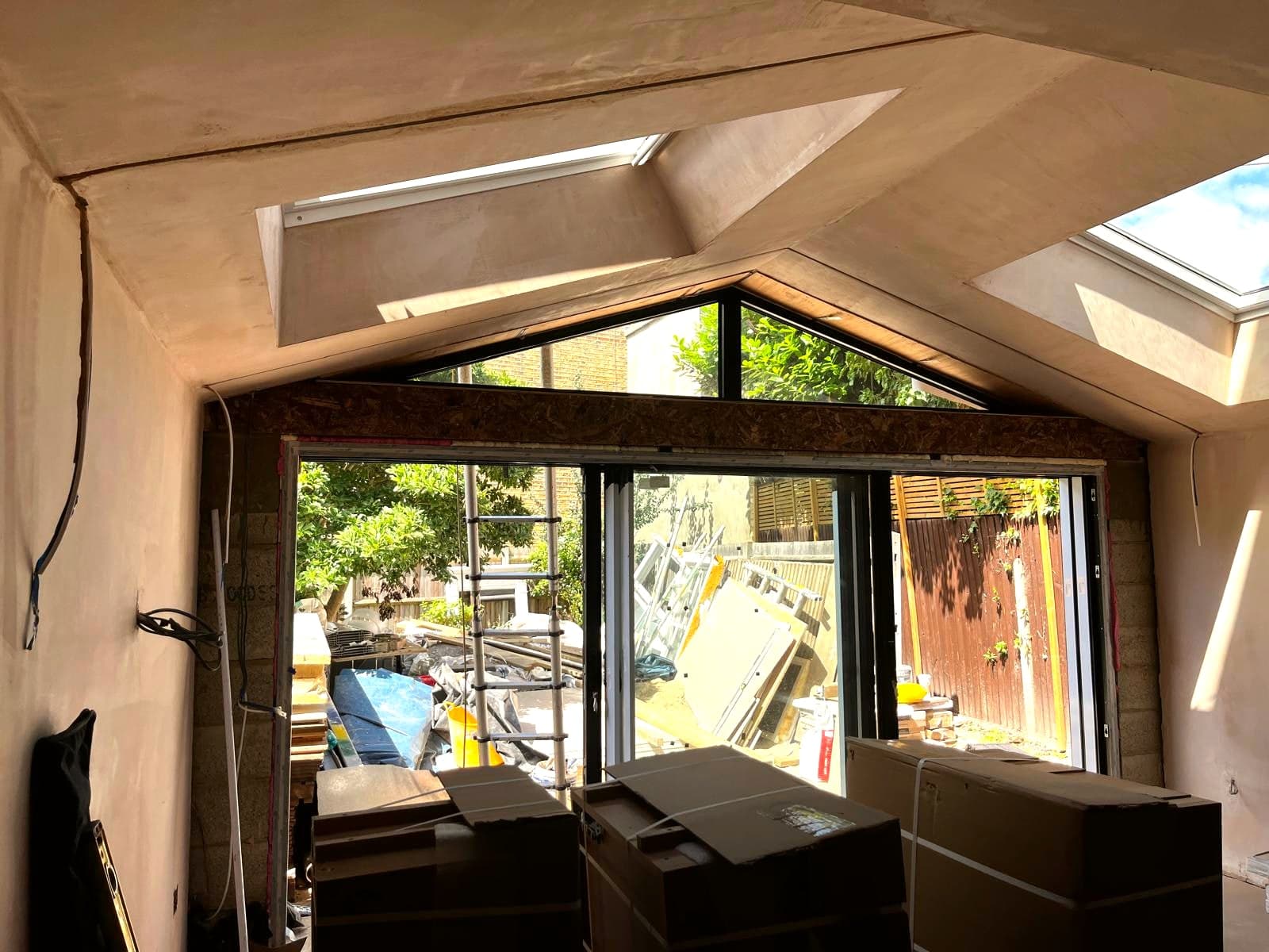 Plastered extension with rooflights and bi-folds in, kitchen units arriving, St Albans AL1