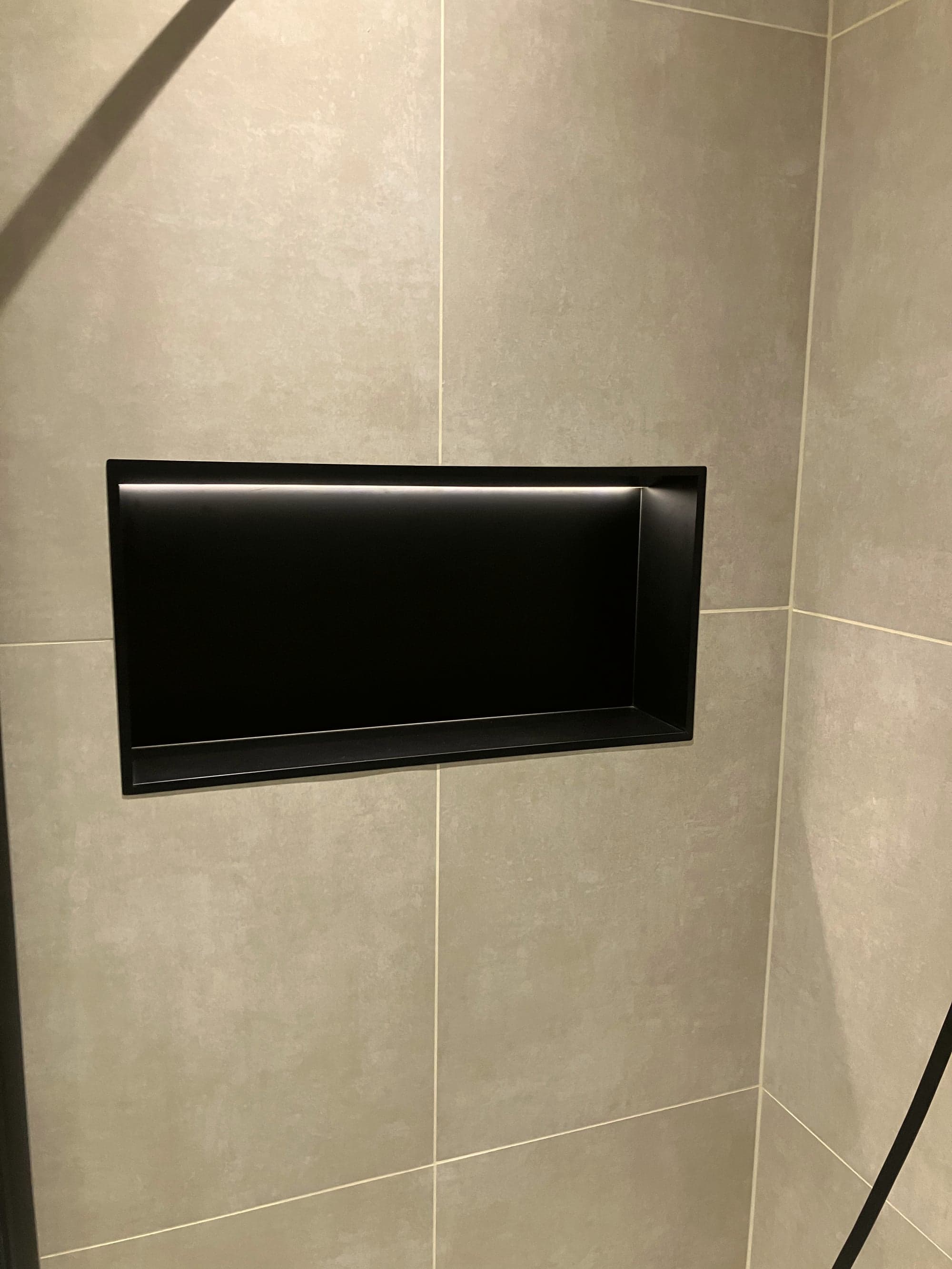 Recessed shower niche finished in matte black, Clapham Common SW4