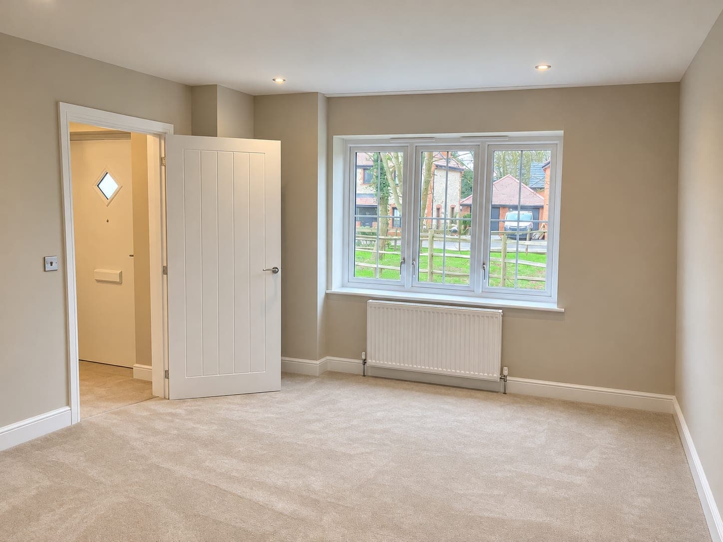 Freshly decorated room with crisp white woodwork and ceiling, London