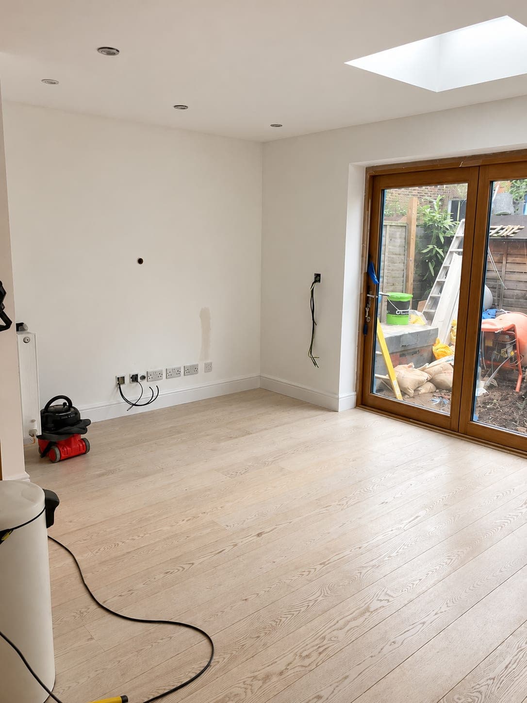 New room complete with rooflight above and full-height glazing to the garden, Stanmore HA7