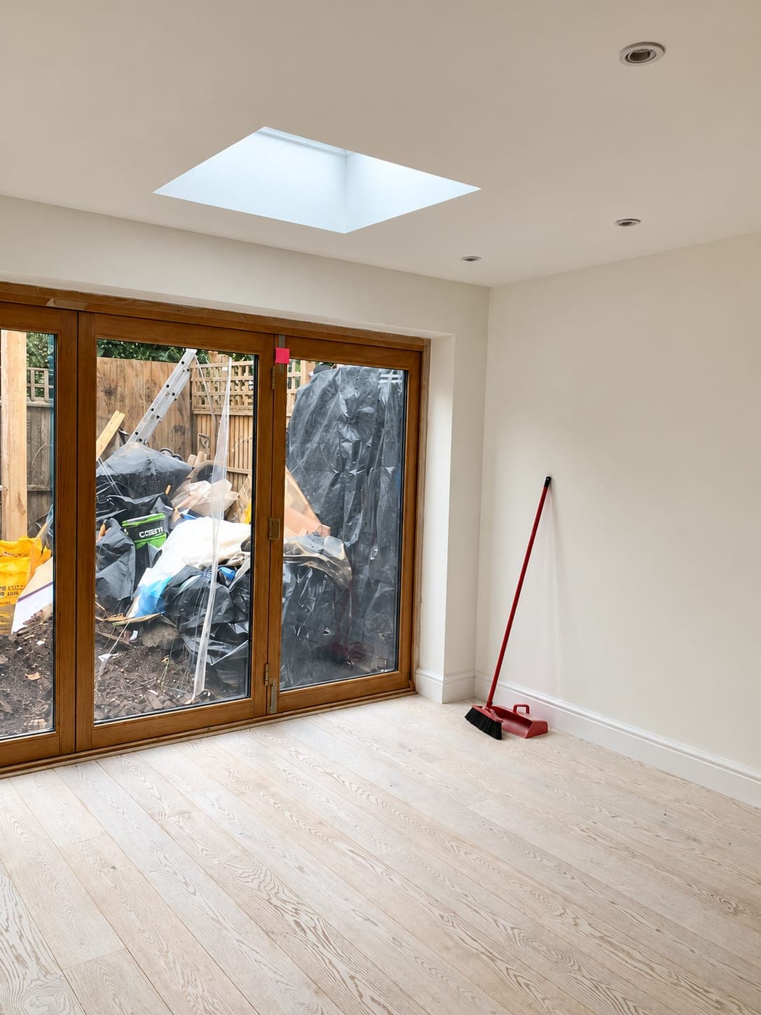 Oak-framed doors and side window with the new floor laid, Stanmore HA7