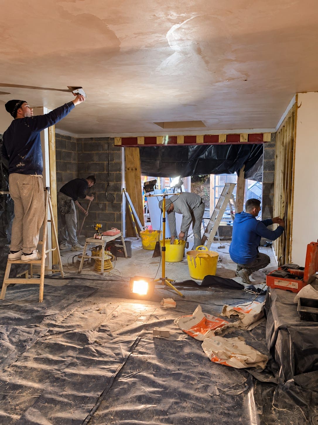 Plastering the new ceiling before the floor goes down, Stanmore HA7