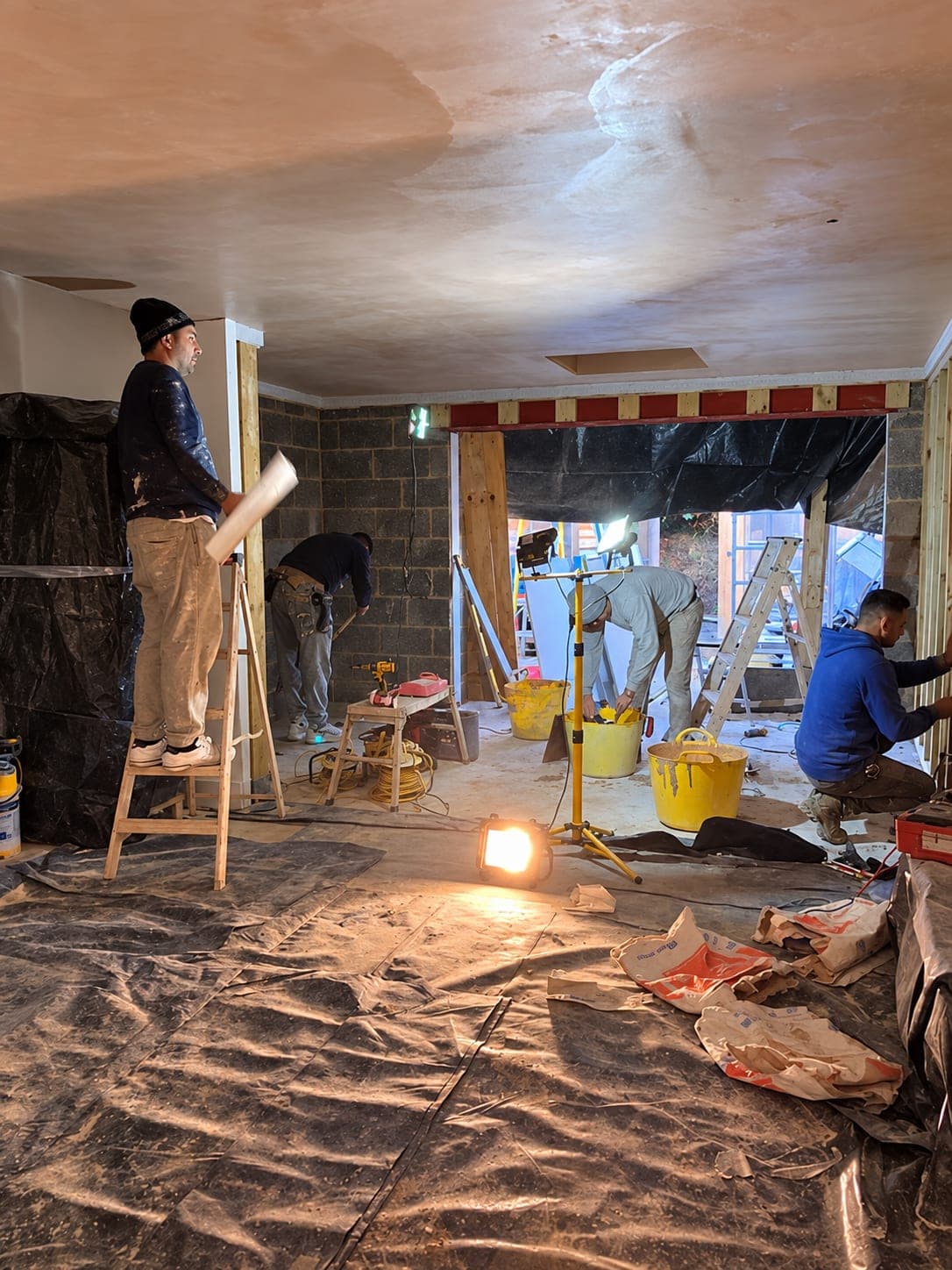 Skim coat being applied to the extension walls, Stanmore HA7