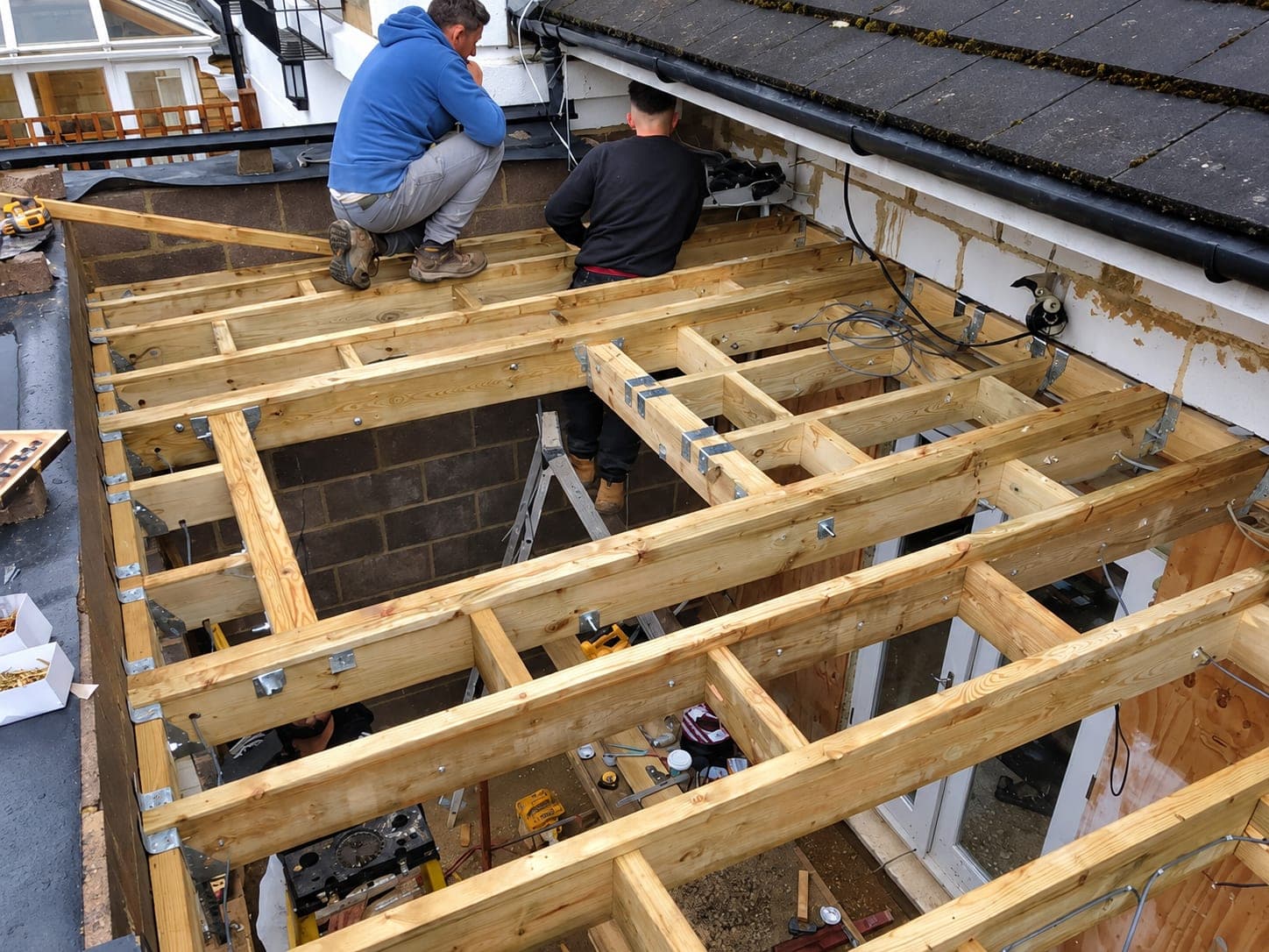 Roof joists being fixed across the new extension, Stanmore HA7