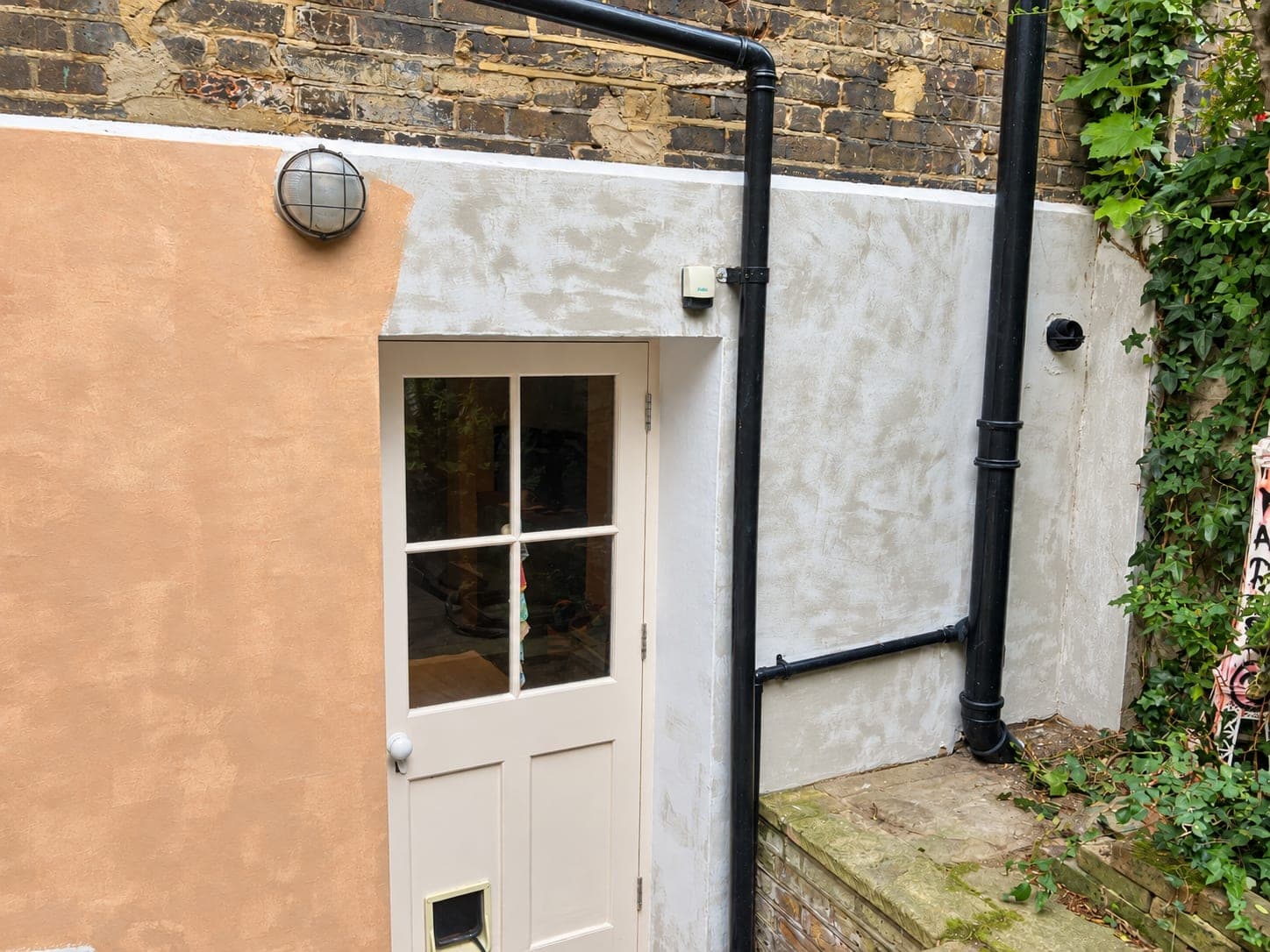 The same view of the lightwell finished in lime colour, Shepherdess Walk N1